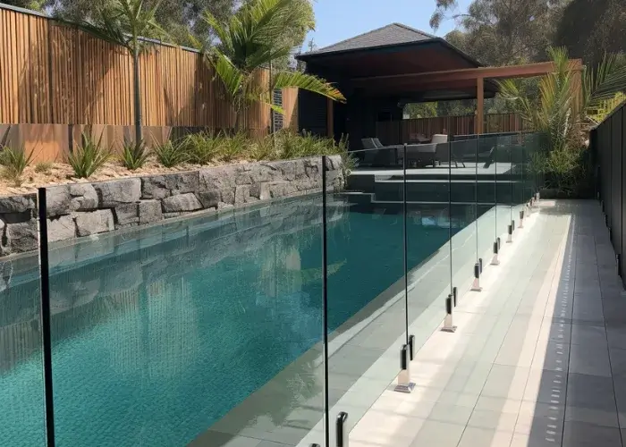 Glass pool fence securing a long backyard pool in Wagga Wagga